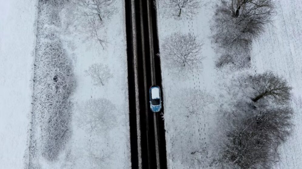 Driving in snow winter weather road